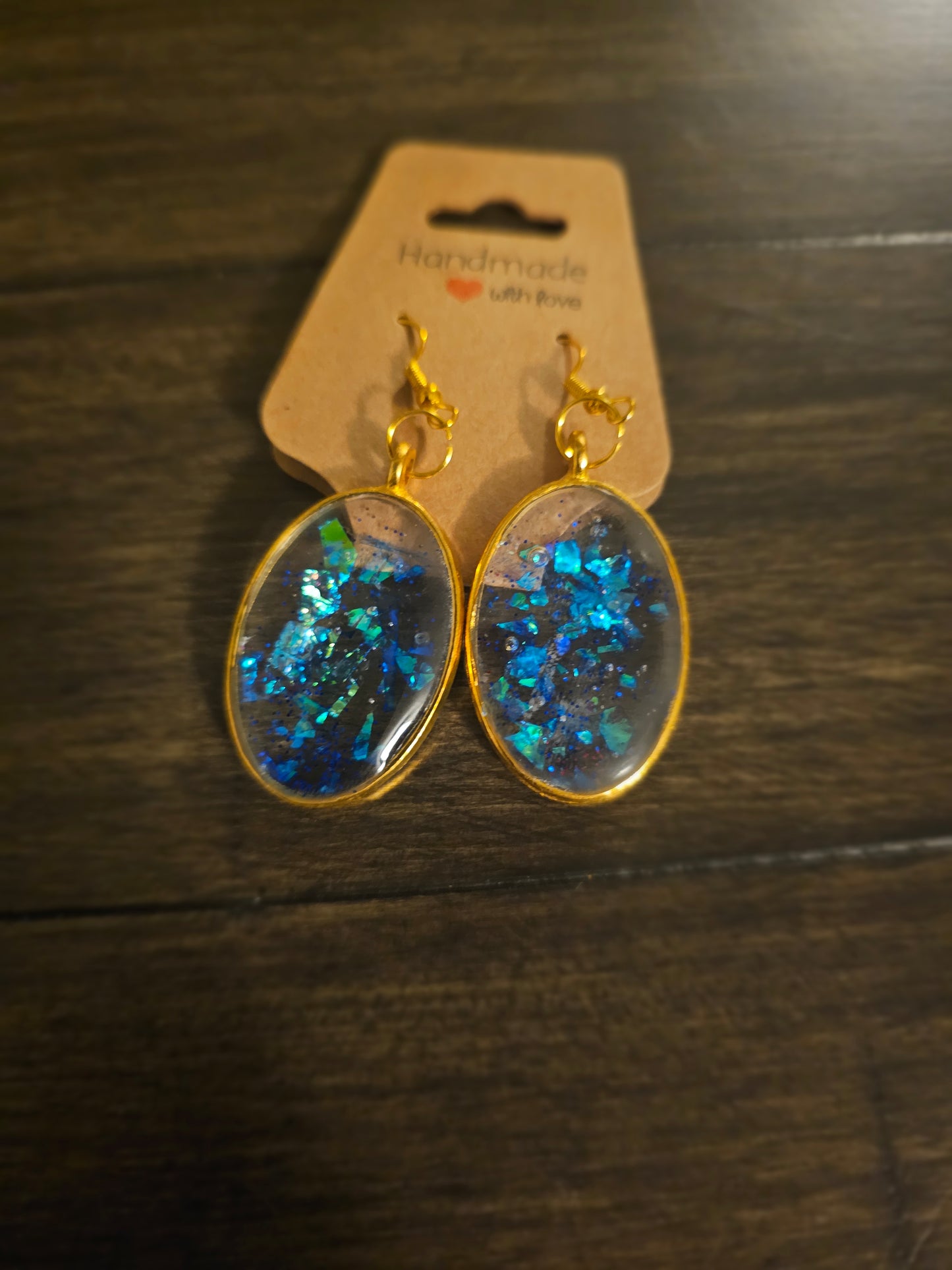 Holographic Oval Dangles