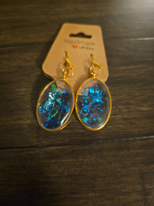 Holographic Oval Dangles