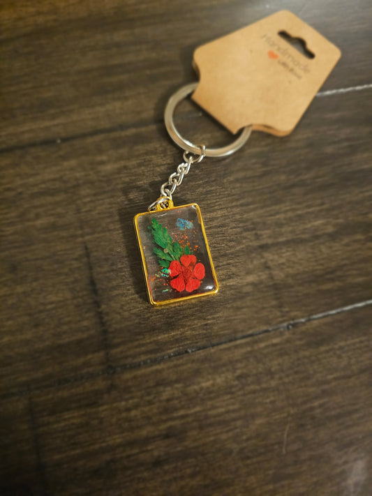 Golden Garden – Square Keychain with Red Flower & Green Leaf